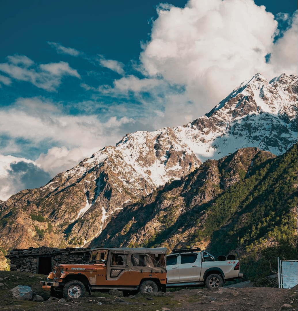 Mountain road and vehicles in northern Pakistan